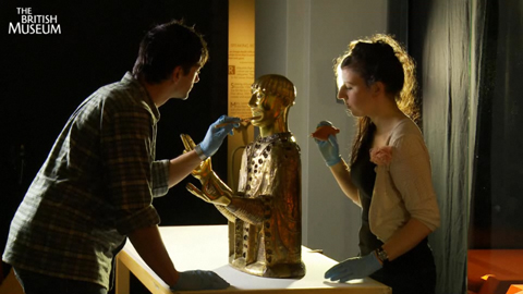 Video still from the British Museum video on the installation of the Reliquary Bust of St. Baudime